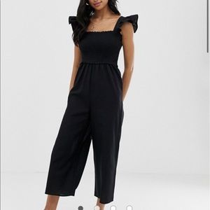 Black smocked jumpsuit